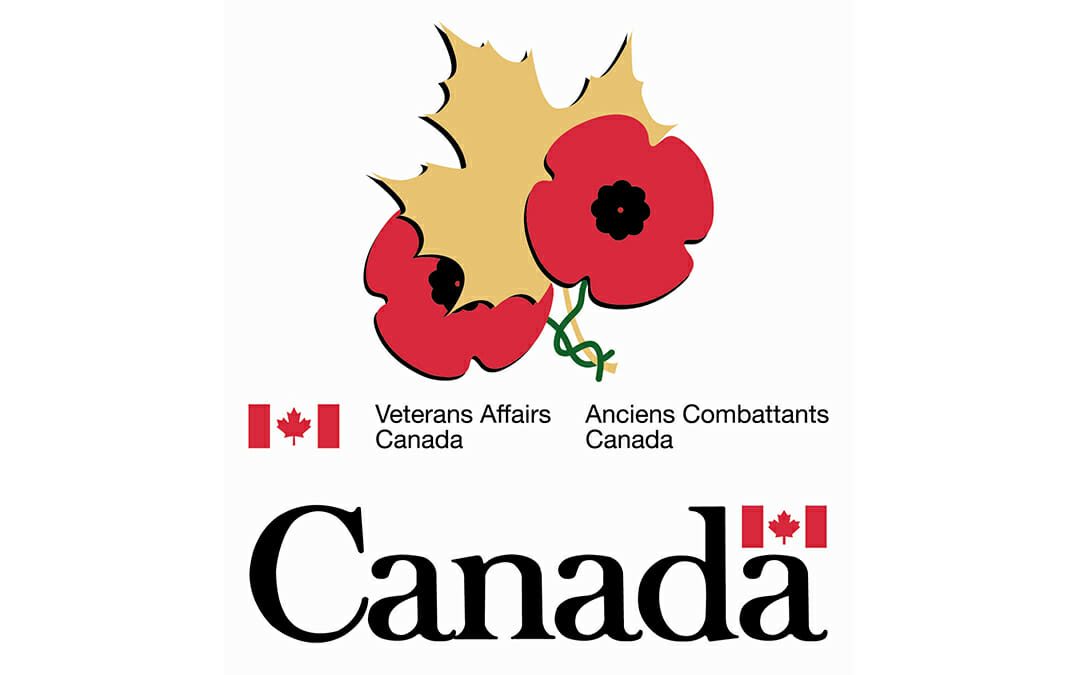 Veterans Affairs Canada Logo. Gold maple leaf with two poppies.