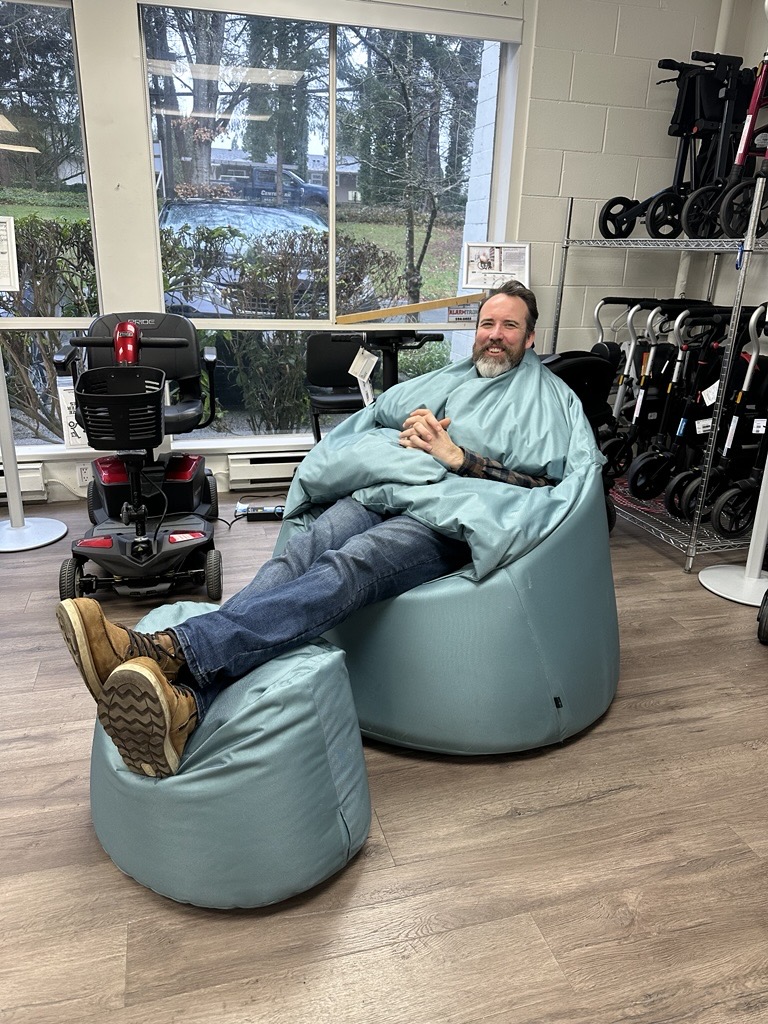 James Cooper testing out some sensory seating in the Burnaby Macdonald's Home Health Care location