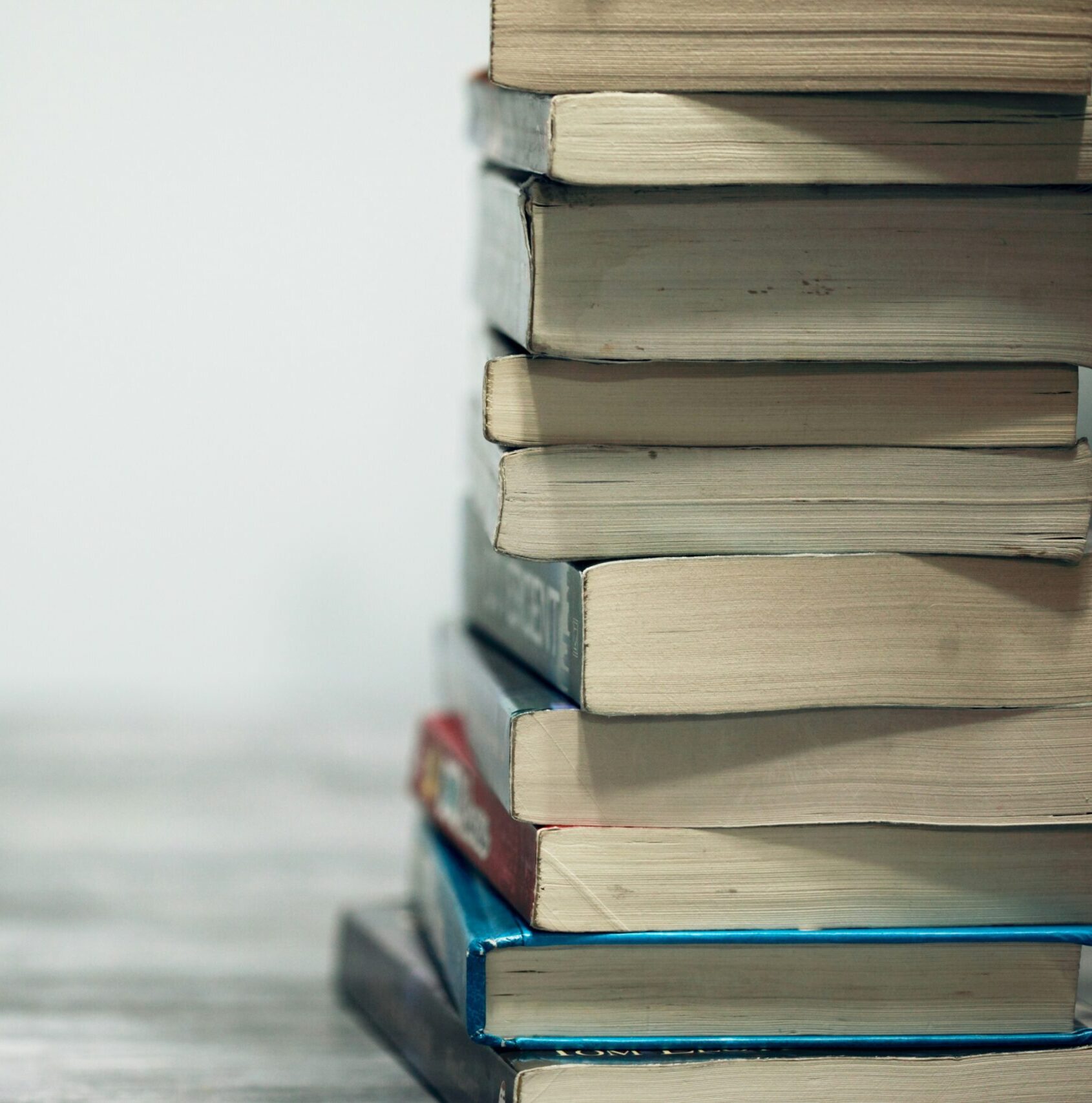 A stack of books, spines turned away