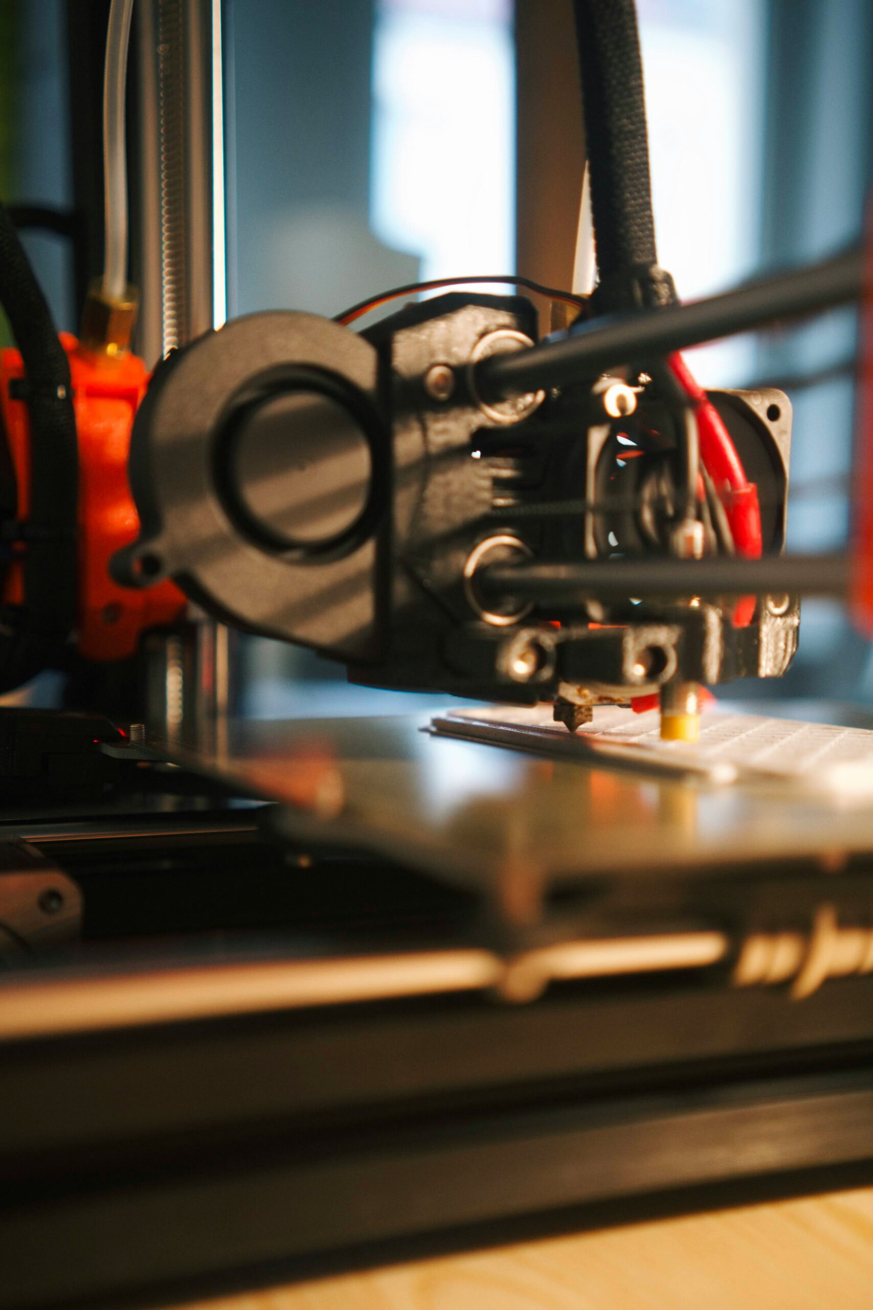 Close up shot of a #D printing laying down filament.